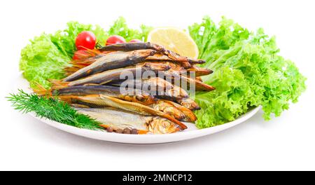Dried smoked capelin on a plate Stock Photo