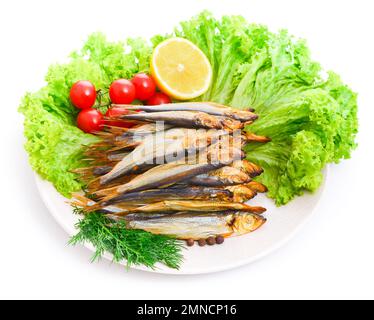 Dried smoked capelin on a plate Stock Photo