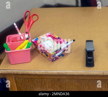 Items on a school desk in a New Jersey high school Stock Photo