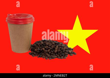 Cup of coffee and a handful of coffee beans against the background of the flag of Vietnam. Largest exporter of coffee in the world. Vietnamese coffee Stock Photo
