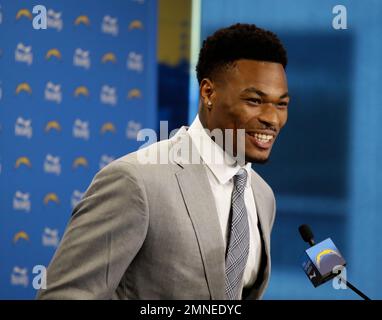 Los Angeles Chargers quarterback Justin Herbert (10) is escorted by senior  public relations manager Jamaal LaFrance after training camp on Tuesday, A  Stock Photo - Alamy