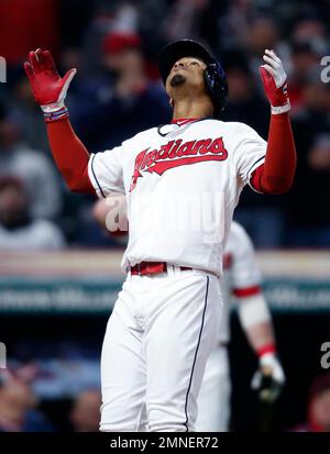 Rajai Davis and Francisco Lindor by Ron Schwane