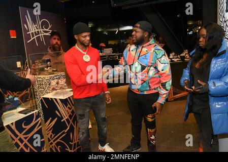 New York, USA. 30th Jan, 2023. Rapper Papoose (left) attends the Modelo and Brooklyn Nets Hall of Fame pop up gallery and sneaker event at Barclay's Center in New York, NY, on January 30, 2023. (Photo by Efren Landaos/Sipa USA) Credit: Sipa USA/Alamy Live News Stock Photo