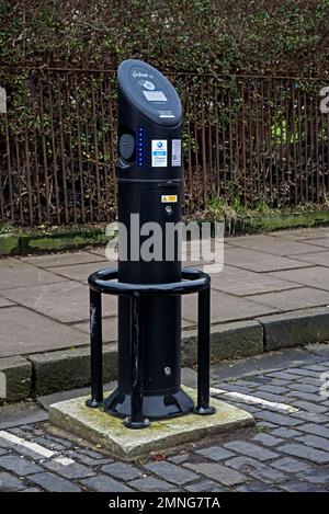 Electric Vehicle (EV) BP Pulse charging point on a street in Edinburgh, Scotland, UK. Stock Photo