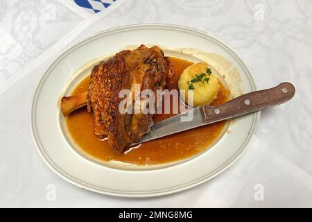 Schweinshaxe (German cuisine) is a roasted ham hock Stock Photo