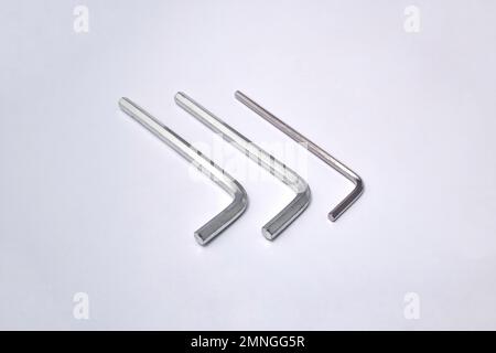 Hex metal allen L key over isolated white background. various sizes Stock Photo