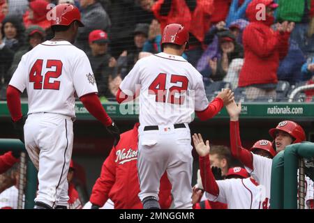 Players wear No. 42 on their jerseys in honor of Jackie Robinson Day during  a baseball game between the Philadelphia Phillies and the New York Mets,  Monday, April 15, 2019, in Philadelphia. (