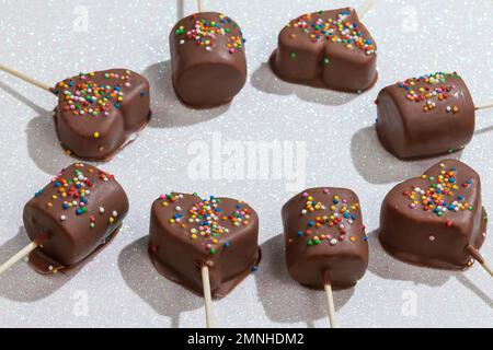Marshmallows Covered With Chocolate And With Mini Colored Dragees. Stock Photo
