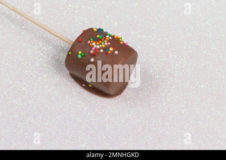 Marshmallows Covered With Chocolate And With Mini Colored Dragees. Stock Photo