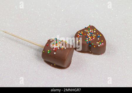 Marshmallows Covered With Chocolate And With Mini Colored Dragees. Stock Photo
