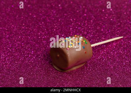 Marshmallows Covered With Chocolate And With Mini Colored Dragees. Stock Photo