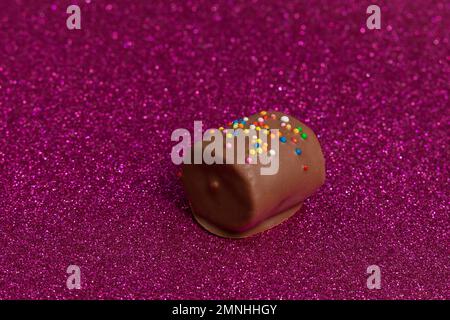 Marshmallows Covered With Chocolate And With Mini Colored Dragees. Stock Photo