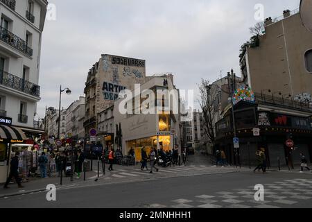 Living in Paris near to Moulin Rouge, urban life in European cities. People walking on big cities. Paris in January. Clichy, 75018 Stock Photo