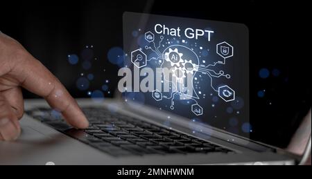 Businessman using chatbot in computer intelligence Ai. ChatGPT, using and chatting artificial intelligence. conversation assistant concept. Stock Photo