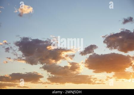 Clouds on blue sky at sunset Stock Photo