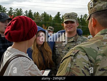 Spc. Jordan Post, New Hampshire Army National Guard, says farewell to family and friends after a departure ceremony held Oct. 3, 2022, at the Edward Cross Training Complex in Pembroke, New Hampshire.  About 170 Soldiers are mobilizing to the U.S.-Mexico border for a year to assist Customs and Border Protection surveil and detect illegal immigrant crossings. Stock Photo