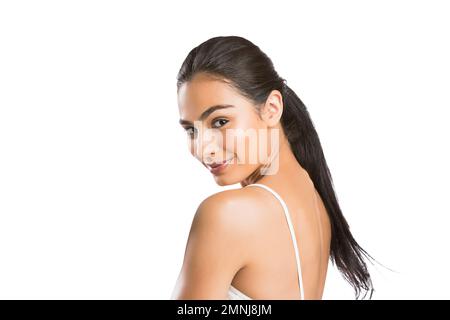 Portrait of young woman looking at camera Stock Photo