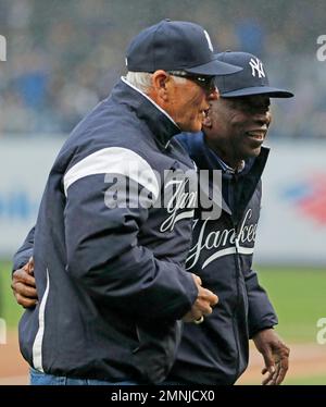 Former New York Yankees player Bucky Dent, left, and Pat Kelly embrace  during Yankees Old Timers Day at Yankee Stadium in New York, Sunday, July  1, 2012. (AP Photo/Kathy Willens Stock Photo 