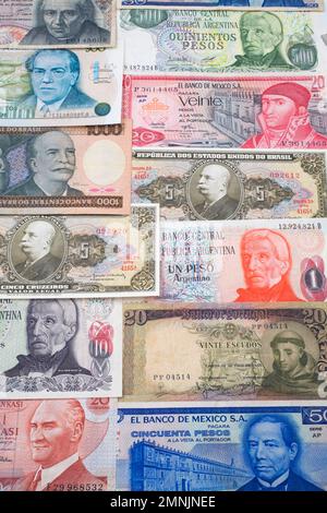 Laid out assorted foreign currency bank notes. Stock Photo