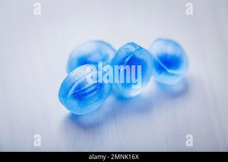 Blue menthol candy fresh balsamic syrup on a white background Stock Photo