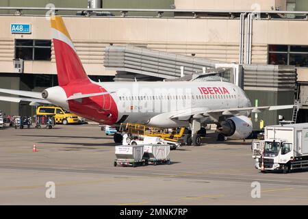 Zurich, Switzerland, January 19, 2023 Iberia Airbus A320-214 aircraft is parking at the gate Stock Photo