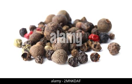 Mix of different pepper grains isolated on white Stock Photo