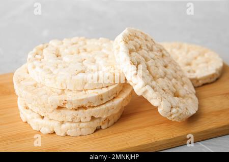 Stack of crunchy rice cakes on table, closeup Stock Photo