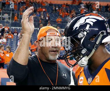 Professional wrestler Bill Goldberg greets Denver Broncos outside  linebacker Von Miller prior to an NFL football game against the Los Angeles  Chargers, Monday, Sept. 11, 2017, in Denver. (AP Photo/Jack Dempsey Stock