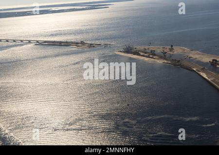 Aerial shot showing damage caused by Hurricane Ian to the Sanibel Causeway near Cape Coral, Florida, October 3, 2022.  The causeway, which is temporarily closed, is the only land-travel access road between Sanibel Island and mainland Florida. Stock Photo