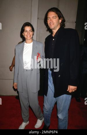 Sela Ward and Howard Sherman at the premiere of The Fugitive at Mann's ...