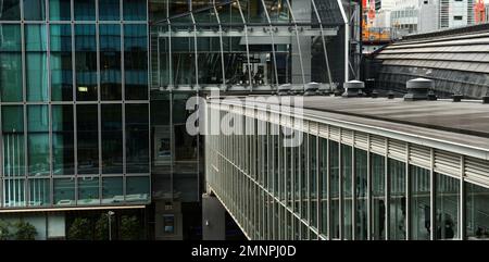 The modern pedestrian bridge connecting the Hikarie tower and the Scramble Square tower in Shibuya, Tokyo, Japan. Stock Photo