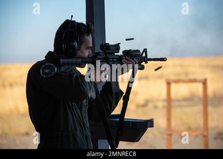 Col. Isaac T. Bell, 366th Fighter Wing Deputy commander, fires a M4 carbine at the off-base shooting range on Oct. 5, 2022 outside of Mountain Home Air Force Base, Idaho. The M4 is the standard issue rifle for the U.S. Air Force. Stock Photo