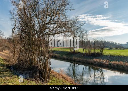 Zurich, Switzerland, January 19, 2023 Landscape scenery with a small river at the international airport Stock Photo