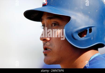 Texas Rangers' Darwin Barney waits to bat during the second inning of a  spring training baseball game against the San Diego Padres, Thursday, March  1, 2018, in Surprise, Ariz. (AP Photo/Charlie Neibergall