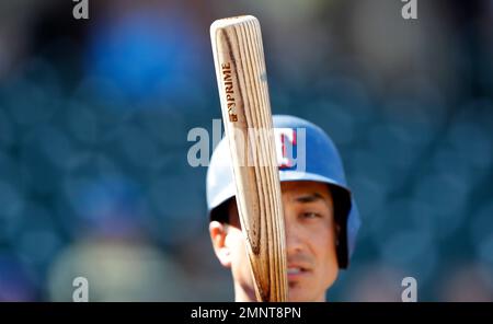 Texas Rangers' Darwin Barney waits to bat during the second inning of a  spring training baseball game against the San Diego Padres, Thursday, March  1, 2018, in Surprise, Ariz. (AP Photo/Charlie Neibergall