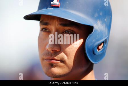 Texas Rangers' Darwin Barney waits to bat during the second inning of a  spring training baseball game against the San Diego Padres, Thursday, March  1, 2018, in Surprise, Ariz. (AP Photo/Charlie Neibergall