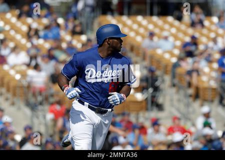 Cleveland Indians' Yasiel Puig runs to first during the fourth