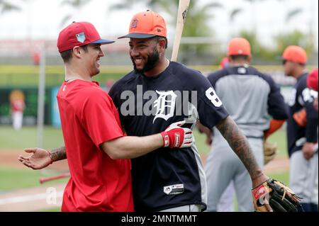 Detroit Tigers' Ronny Rodriguez, right, greets Daryl Patterson, a