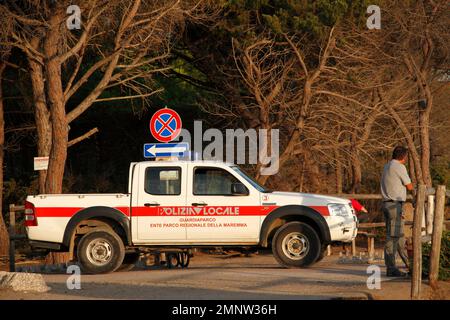 Park Rangers car, part of local police, with ranger watching over the Parco Naturale della Maremma, Province Grosseto, Tuscany, Italy Stock Photo