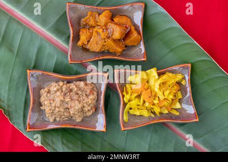 Top view Ethiopian cabbage, Ethiopian Spicy Pumpkin, Ethiopian Lentil Stew, three Ethiopian vegetarian dishes Stock Photo