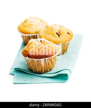 Sweet vanilla muffins isolated on the white background. Stock Photo