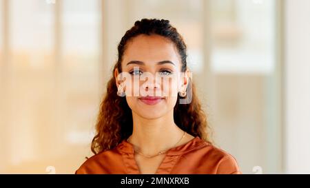 Face of a latino HR administrator smiling inside a room. Portrait of a happy, confident and beautiful Human Resource professional woman, specialist or Stock Photo