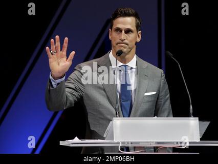 Former Tampa Bay Lightning center Vincent Lecavalier with his wife  Caroline, and his children Amelia, Gabriet, and Victoria, during his jersey  retirement ceremony before an NHL hockey game against the Los Angeles