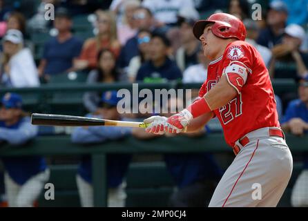 FILE - In this Sept. 10, 2017, file photo, Los Angeles Angels' Mike Trout  watches his solo home run in the first inning of a baseball game against  the Seattle Mariners in