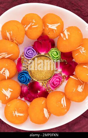 Indian Bengali Mithai Orange Kheer Mohan Also Called Khira Mohan, Santre Ki Kheer, Or Santra Khir Mohan Is Orange Color Softball made of Chena Balls, Stock Photo