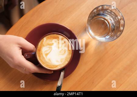 Portrait of a sensual, nude woman holding an aromatic cup of coffee Stock  Photo - Alamy