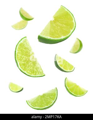 Collage of falling limes on white background Stock Photo