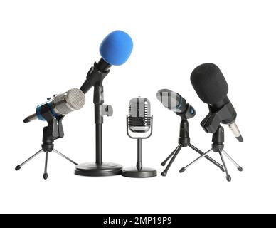 Set of different microphones isolated on white. Journalist's equipment Stock Photo