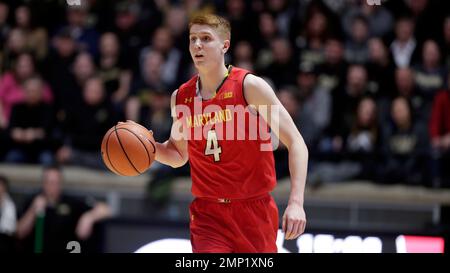 Maryland guard Kevin Huerter (4) brings the ball up court against Purdue in  the first half