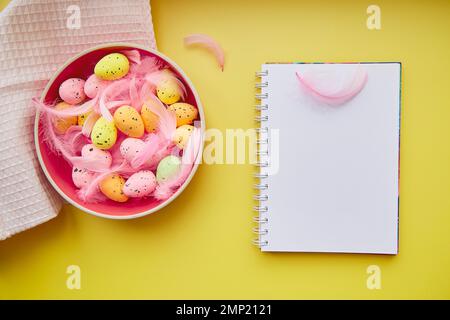 Creative Easter notepad mock up on yellow background. Decorated Easter ...